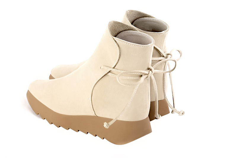 Champagne beige women's ankle boots with laces at the back. Square toe. Low rubber soles. Rear view - Florence KOOIJMAN